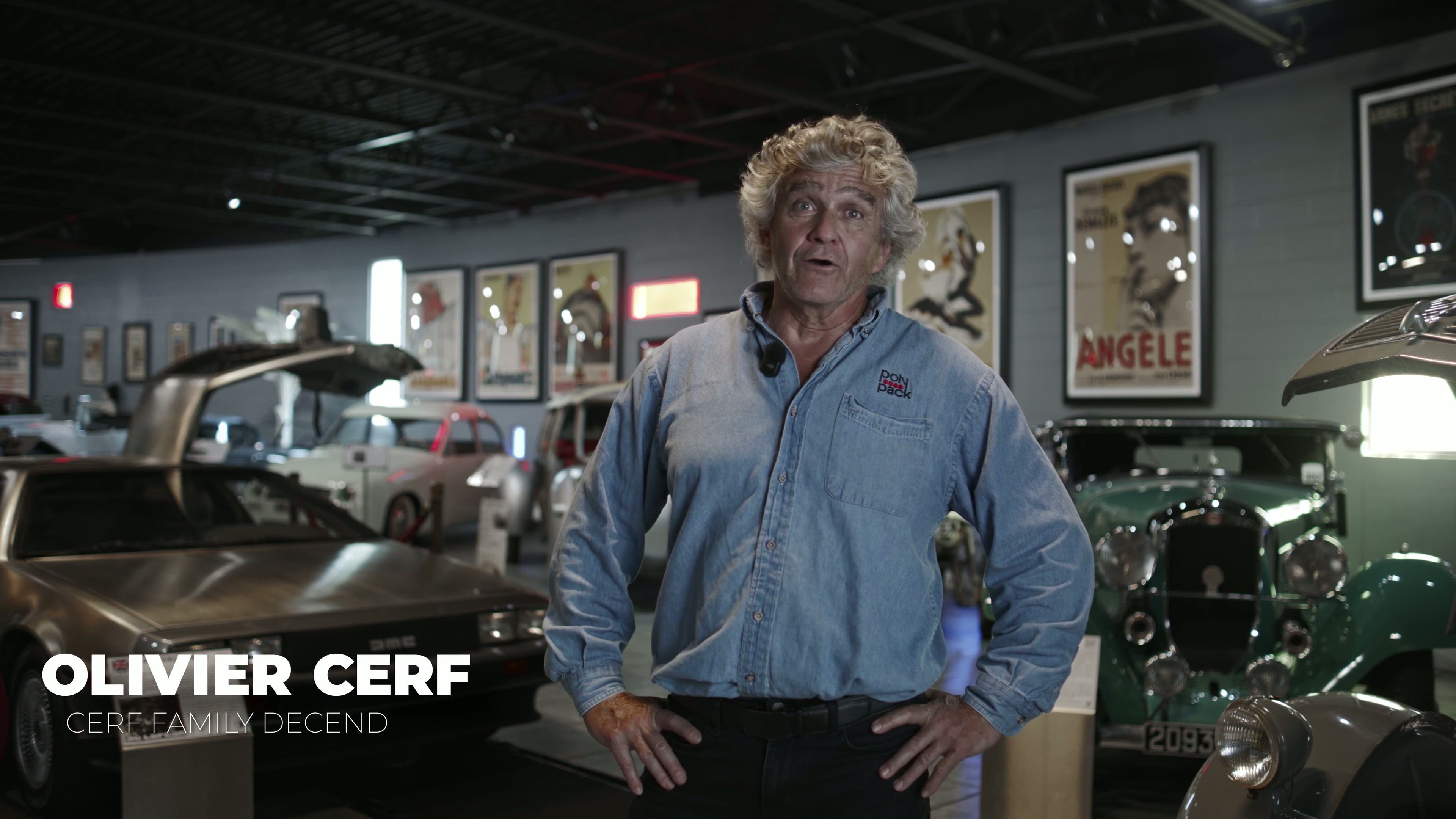 Classic cars lined up inside an automotive museum, filmed on a cinema camera. Documentary production on location by HighDollar Films.