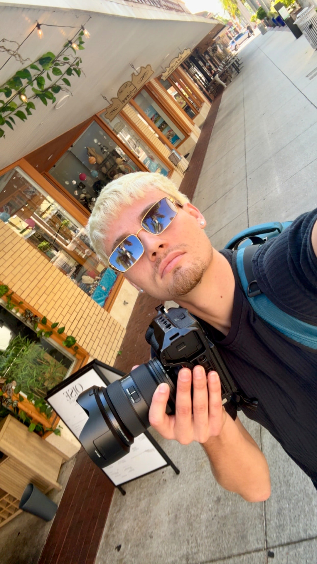 HighDollar Films founder Tommy Ganos on location with a cinema camera in Southwest Florida.